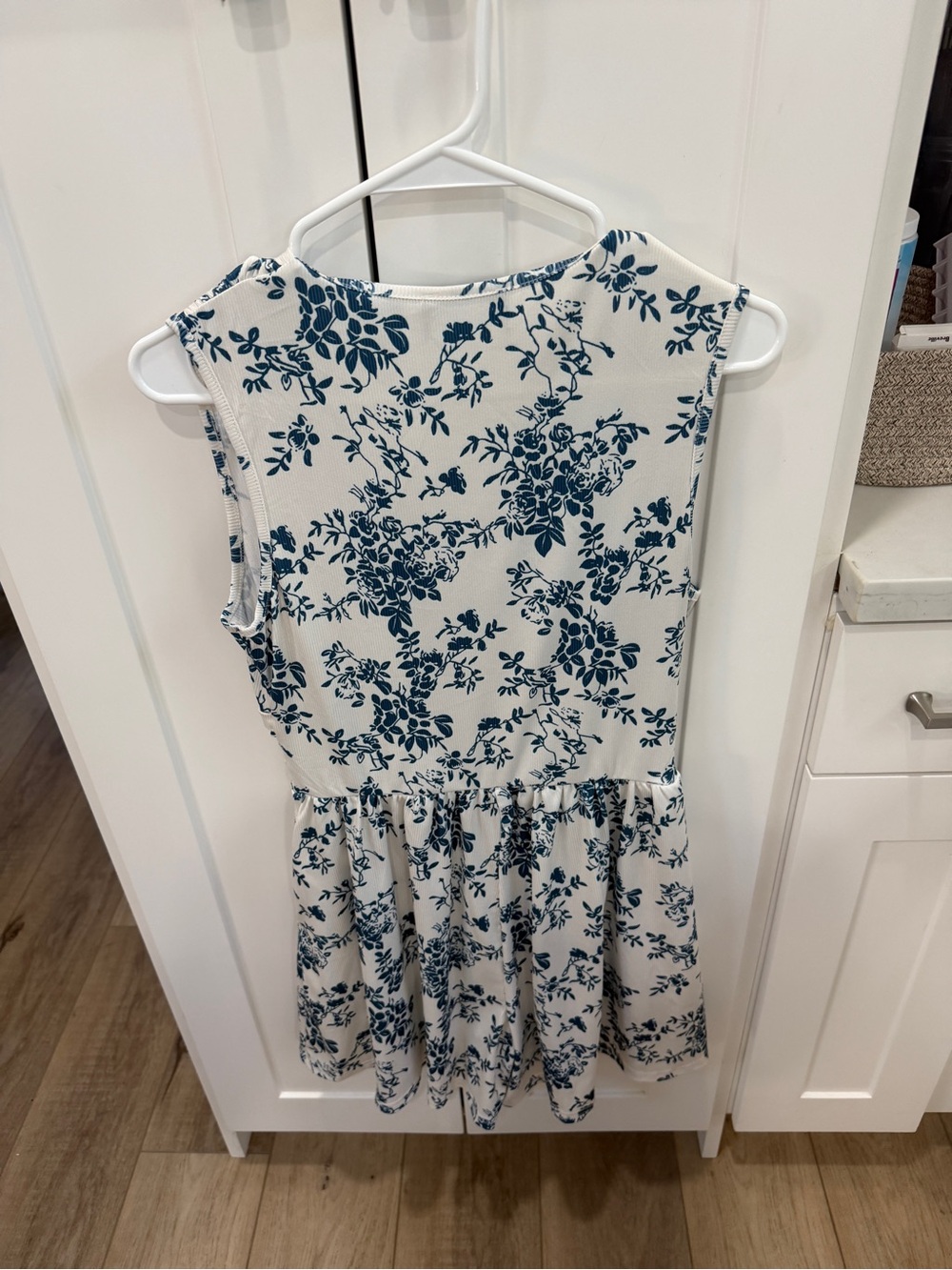 Cider White Romper with Navy Blue Floral Pattern - Picture 5 of 5